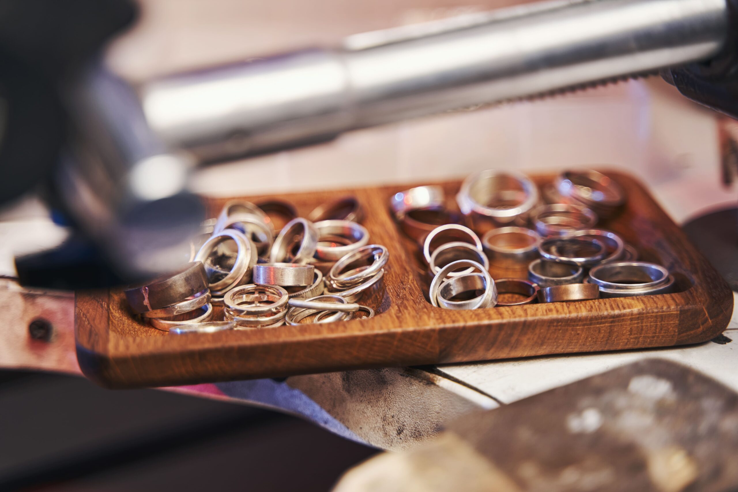 box with rings lying on jeweler table 2023 11 27 05 19 14 utc 1 scaled