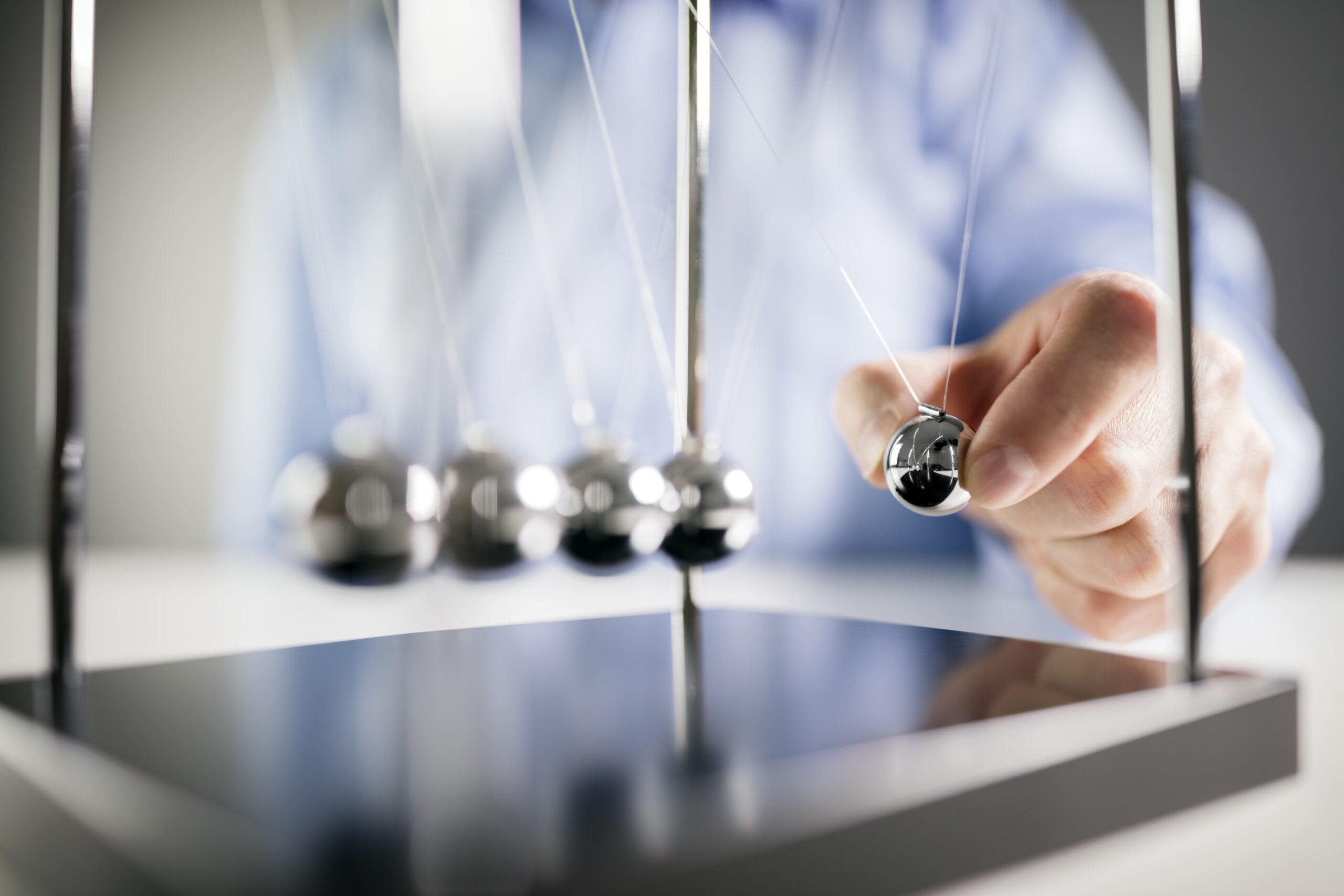 newton s cradle businessman concept for cause and 2024 09 16 23 51 19 utc 1 1 scaled