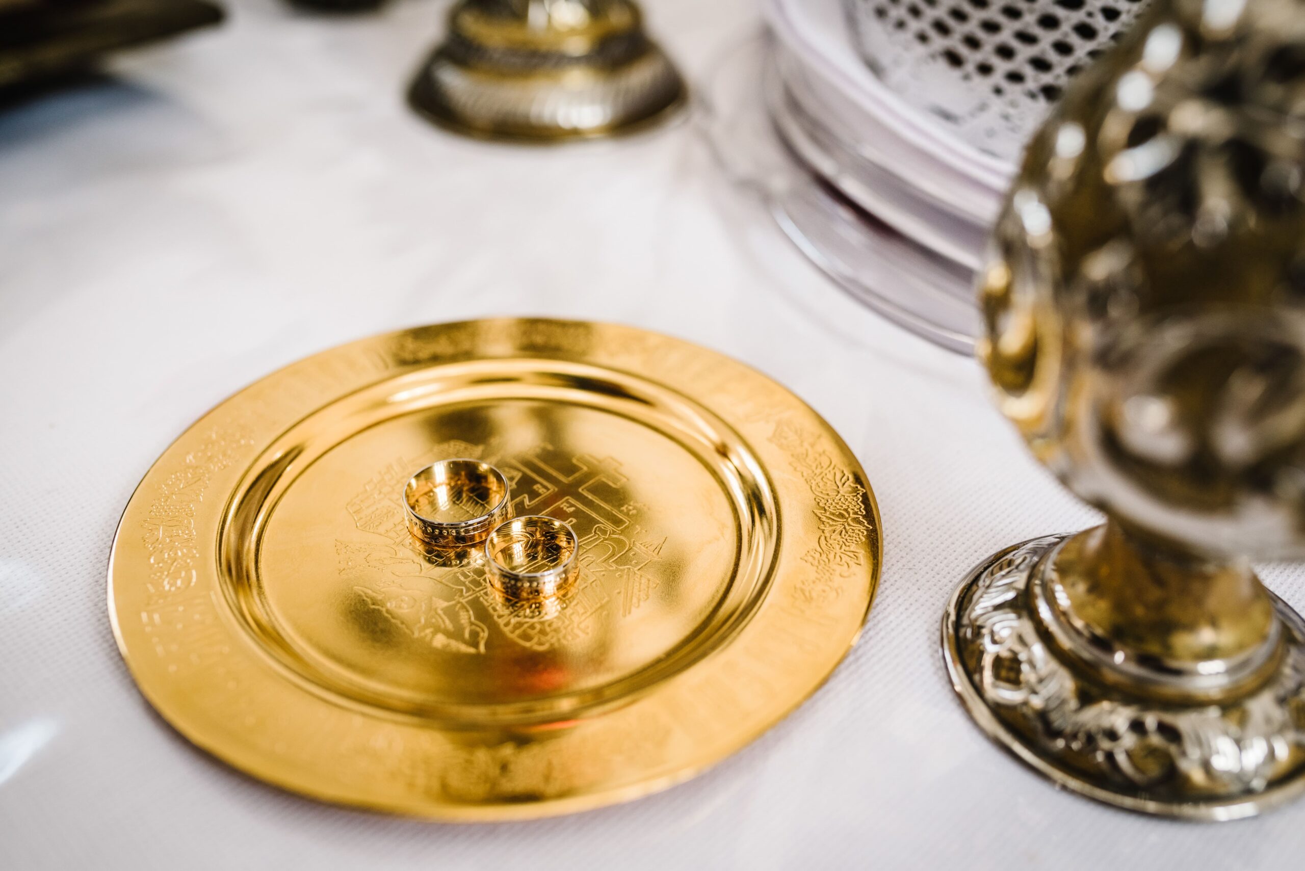 photo of wedding rings in gold in the church 2025 01 09 04 38 10 utc scaled