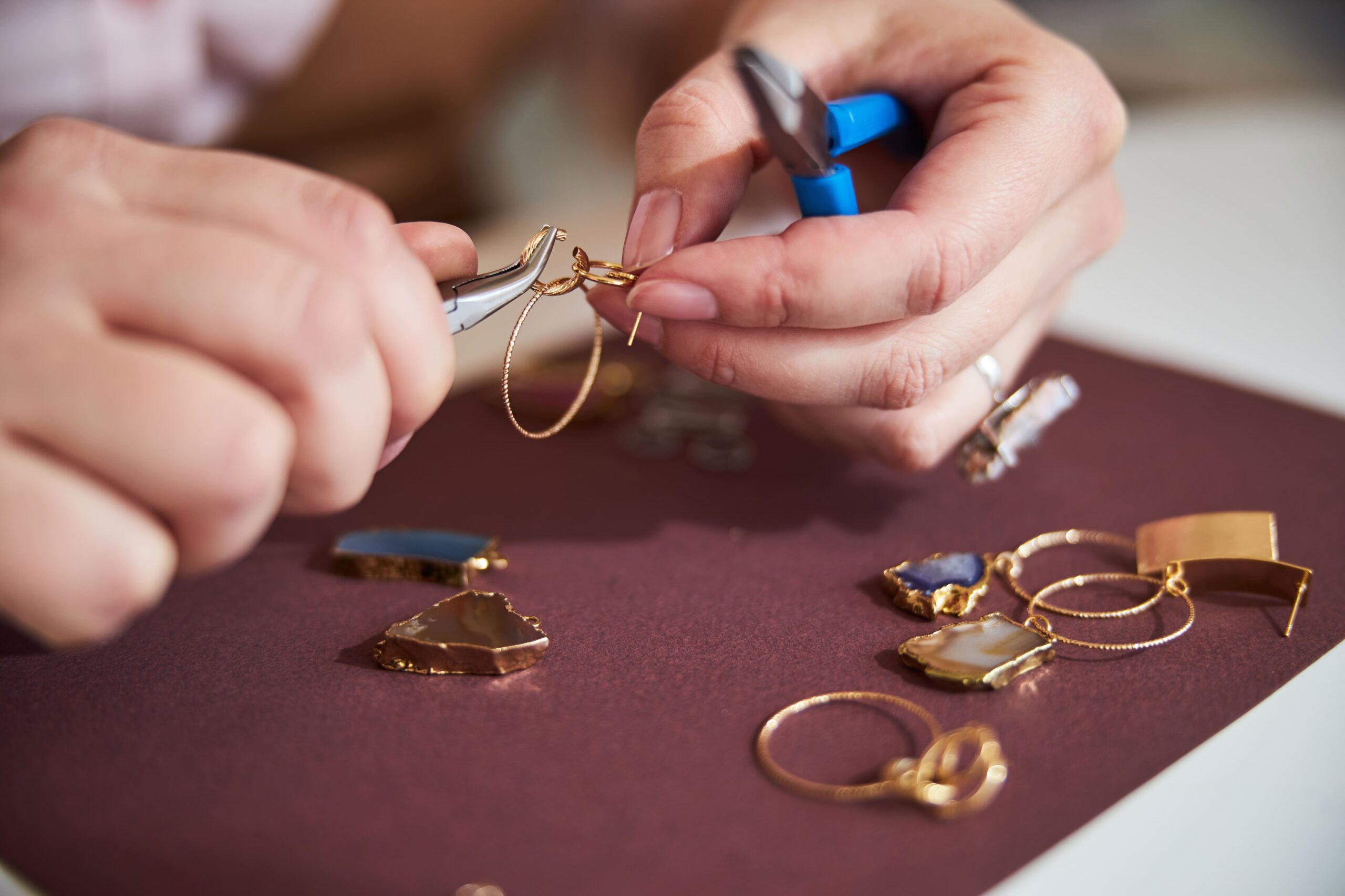 skilled caucasian female jeweler creating an earri 2024 10 18 09 01 07 utc 1 scaled